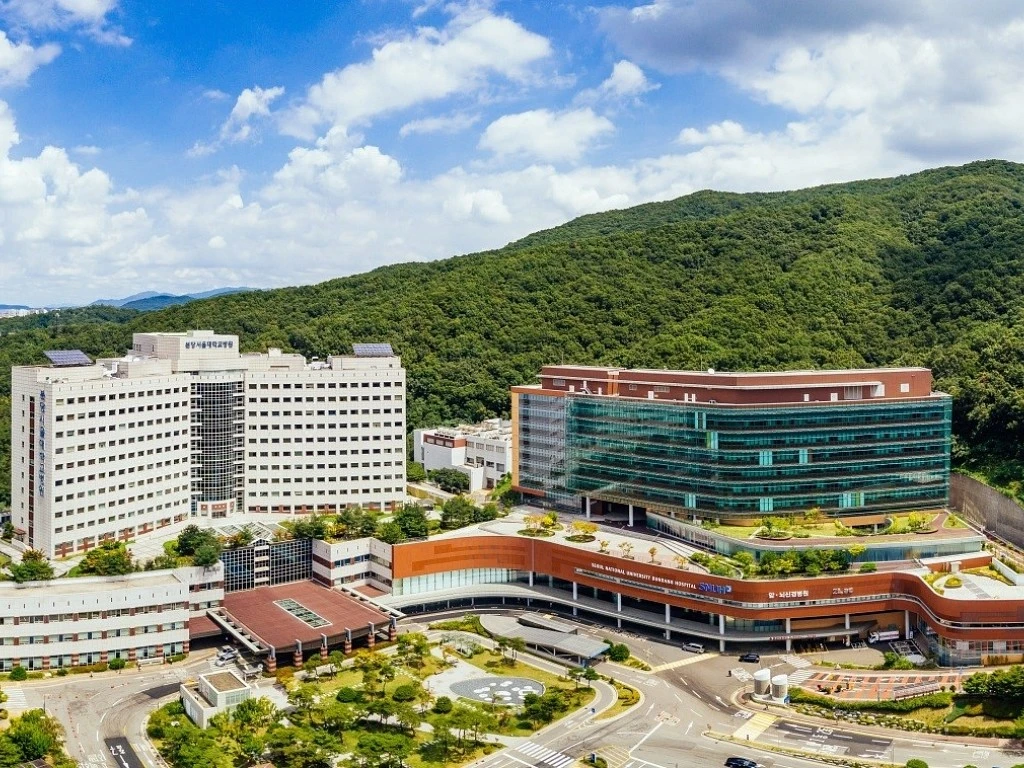 Seoul National University Club and student life guide featuring Seoul National University campus buildings and surrounding green landscape