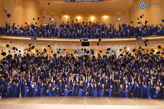 Yonsei University Clubs and student life featuring students celebrating at a university graduation ceremony